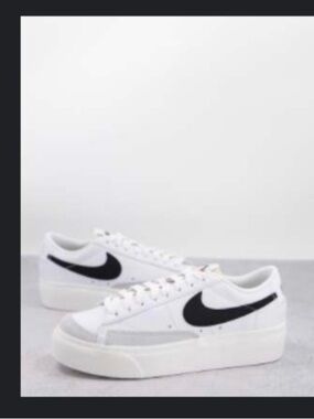 Nike Blazer Low Platform sneakers in white and black
